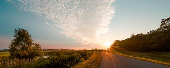 a road during the sunrise