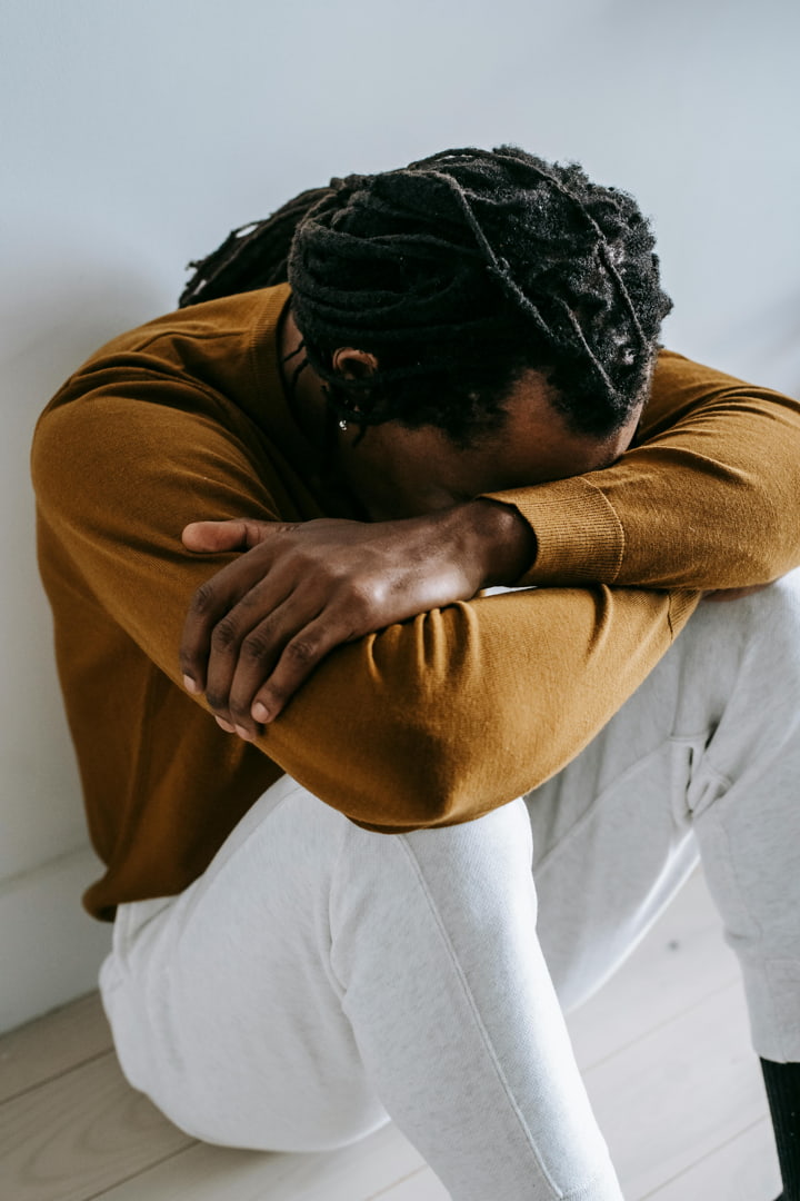 a man upset on the floor